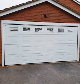 China Manufacturer Steel Sectional Garage Door with PU Foam