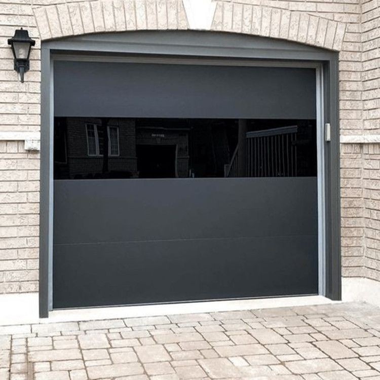 Black modern garage door with smooth flush sectional panels frameless design